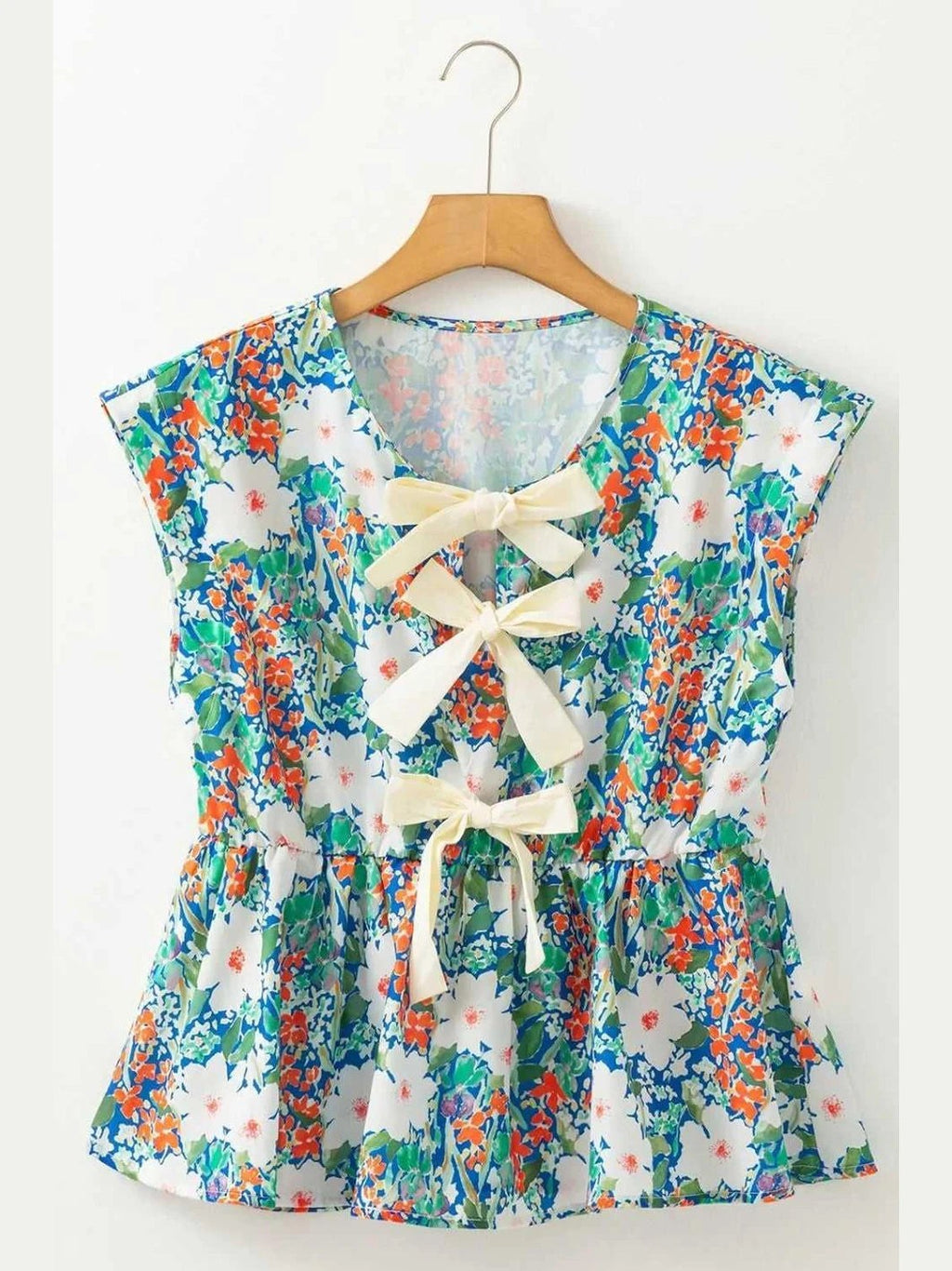 Floral Print Bow Applique Slit Sleeveless Peplum Blouse -- 