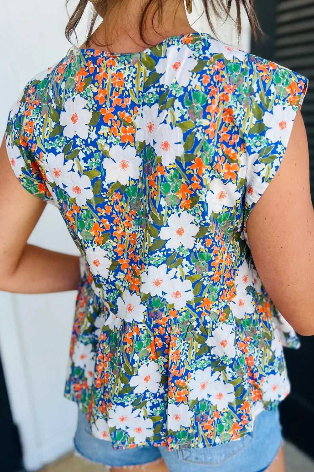 Floral Print Bow Applique Slit Sleeveless Peplum Blouse